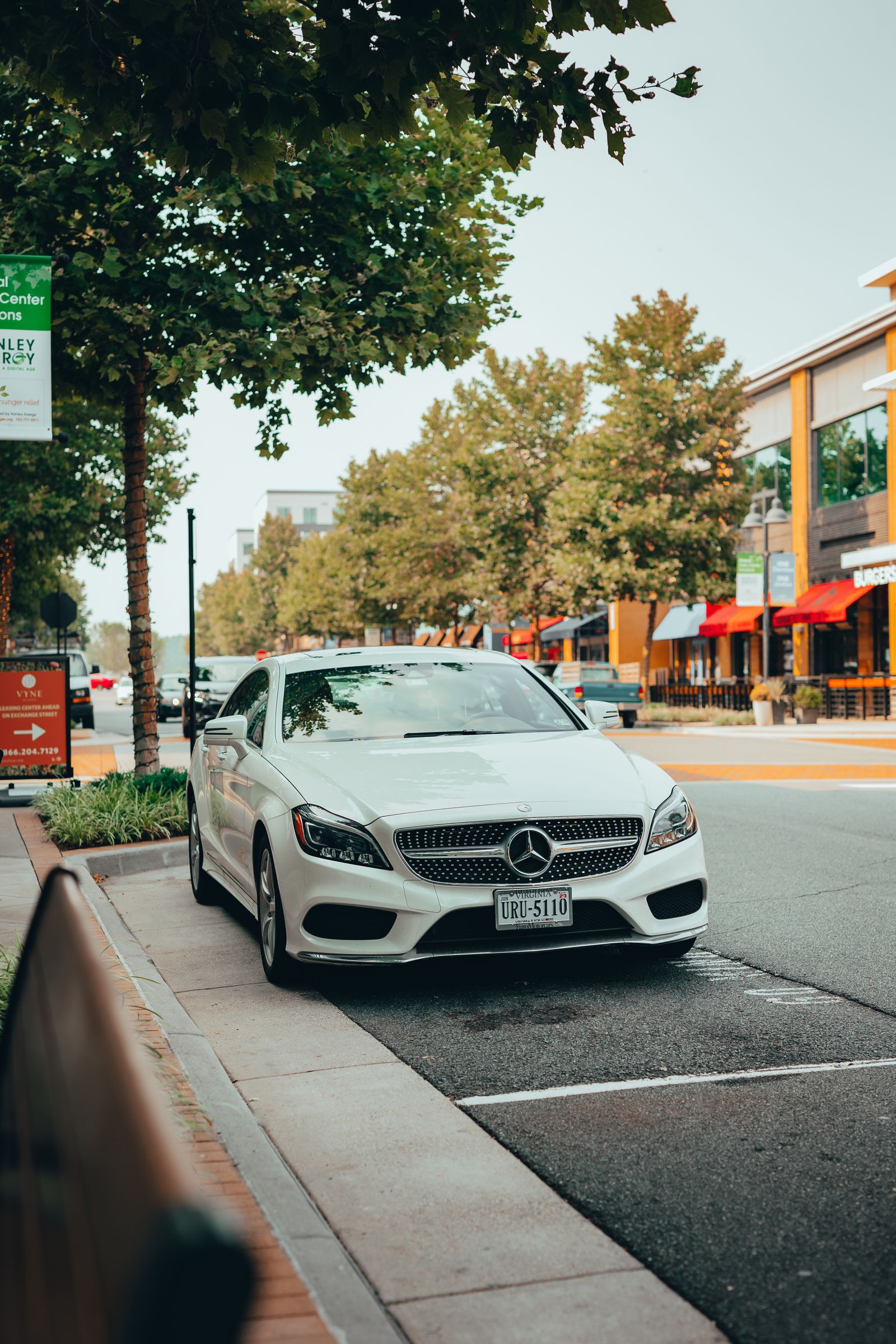 White Mercedes on a city street